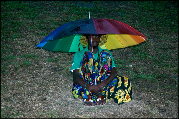 Man under Umbrella at Woodford Music festival 2010